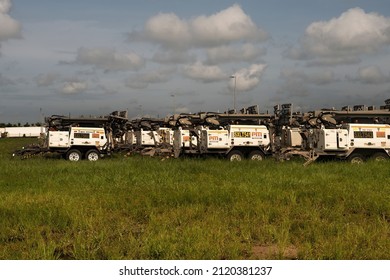 Mackay, Queensland, Australia - 03 Feb 2022; A Fleet Of Mobile Lighting Towers Used In Central Queensland Coal Mines Parked In A Field.