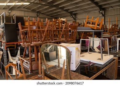 Mackay, Queensland, Australia - 23 Dec 2021; Chairs And Furniture Being Recycled At A Dump Shop Run By A Not For Profit Charity.