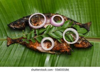 Mackerel Fry. Fried Or Grilled Fish In Green Banana Leaf Kerala India. Very Popular Indian  Food Seer Made With Coconut Oil