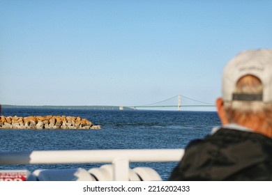 The Mackinac Bridge And Straits Of Mackinac From A Ferry Boat.