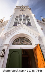 Mackinaw Island, Michigan, USA - August 8, 2018: Exterior Of The Historical St. Anne's Church On Mackinac Island. The Roman Catholic Church Has Parish Records That Date Back Almost Three Hundred Years