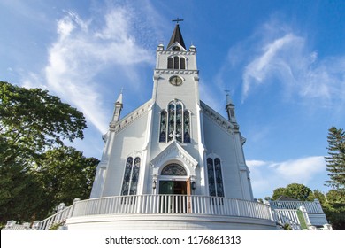 Mackinaw Island, Michigan, USA - August 8, 2018: Exterior Of The Historical St. Anne's Church On Mackinac Island. The Roman Catholic Church Has Parish Records That Date Back Almost Three Hundred Years