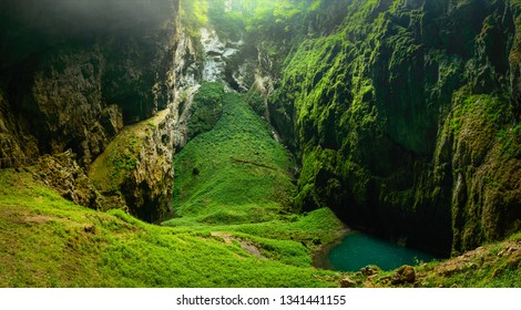 Macocha Abyss, Moravian Karst Microclimate With Juicy Greenery And A Small Lake.