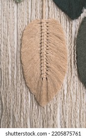 macrame beige feather cotton string on wall feather closeup - Shutterstock ID 2205875761