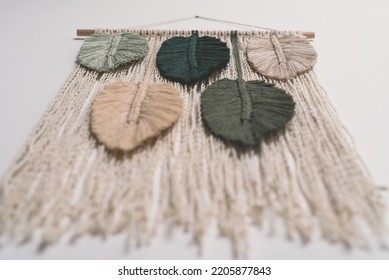 Macrame Handmade Artistic Wall Hanging Fiber Art Decoration With Leaf Feather Symbols Wood Stick White Background Interior Plant Macramé Nature Deco With Green Forest Olive Frappe Beige Colors