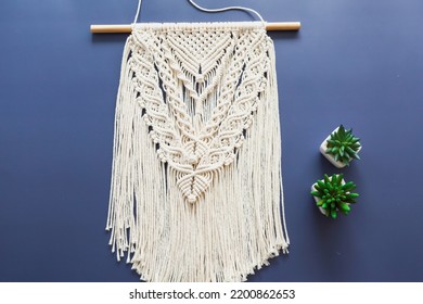 Macrame Wall Hanging  On Blue Background