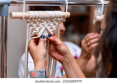 Macrame Workshop. Macrame Studio: Women Creating Exquisite Textile Art - Powered by Shutterstock