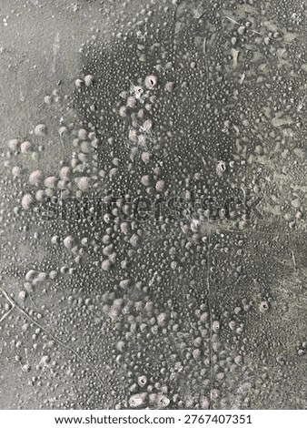 Macro Abstract Texture of Weathered Metallic Surface with Corroded Bubbles and Gritty Gray Patina