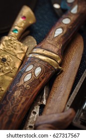 macro antique daggers on counter in bazaar - Shutterstock ID 627317567