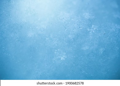 Macro Background Of Fresh Snowflake Texture On A Blur.