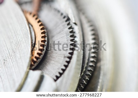 Macro, background with metal cogwheels a clockwork. Conceptual photo for your successful business design