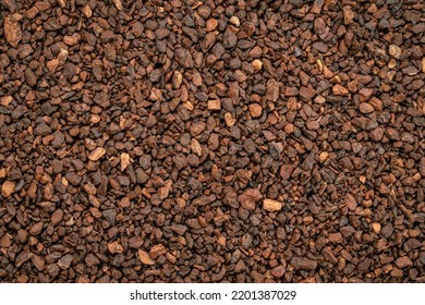 Macro Background And Texture Of Chicory Granules Often Used With Or As A Substitute For Coffee, Made From The Root Of The Chicory Plant, Cichorium Intybus, Also Known As Endive.