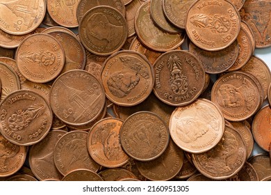 Macro baht coin,Macro coin,Double Exposure of Coins ,Piles of coins on the table.Money thai coins background. Various coins used in Thailand - Shutterstock ID 2160951305