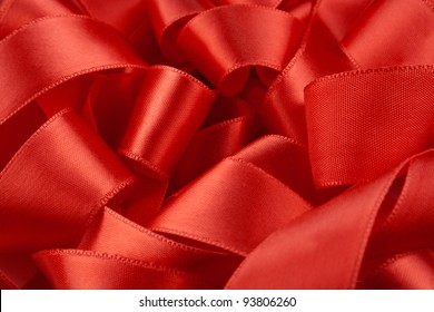 Macro Of 	Beautiful Red Satin Ribbon Background