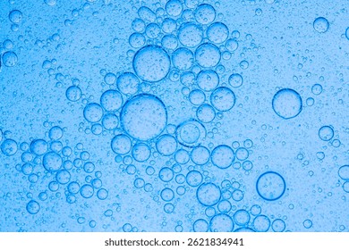 Macro blue science experiment bubble texture,A close-up of a blue liquid with bubbles in a petri dish, showcasing a captivating microscopic view. ideal for concepts of science, medicine, research, and