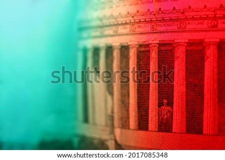 Macro blurry banknote. Close-up selective focus 5 dollars. The United States five-dollar bill. The reverse of the current five-dollar, the Lincoln Memorial. 