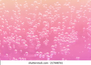 Macro Bubble Of Water On Pink Background