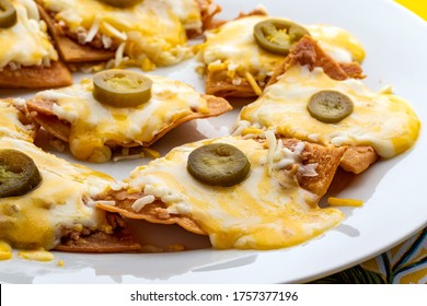 Macro Close Up Of Appetizing Mexican With Melted Cheese And And Hot Tasty Jalapeño Chillies.