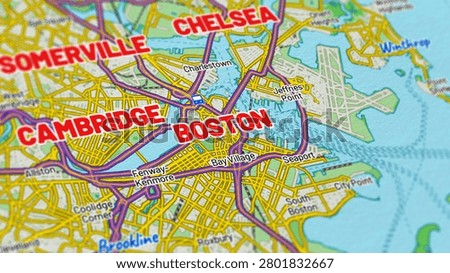 Macro close up of a Boston Massachusetts map showcasing detailed streets, roads, neighborhoods, and modern cartography with sharp geographic details, suitable for travel, navigation, geography, and location themes.