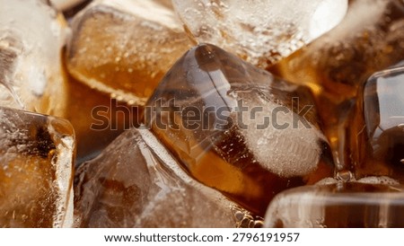 Macro Close Up of cola bubbles and ice cubes background