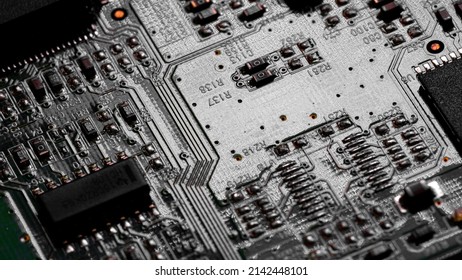 Macro Close up of components and microchips on PC circuit board	