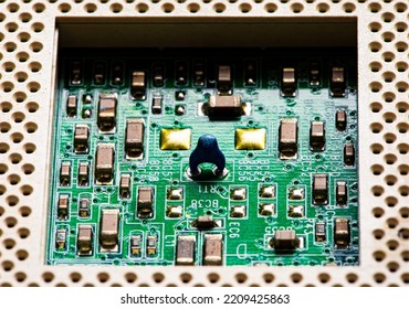 Macro Close up of components and microchips on PC circuit board.