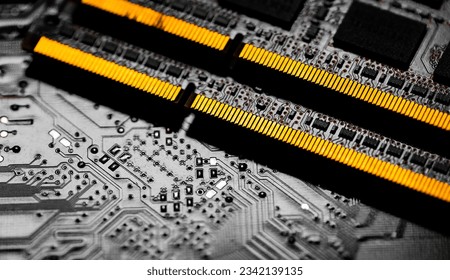 Macro Close up of computer RAM chip and motherboard on dark background