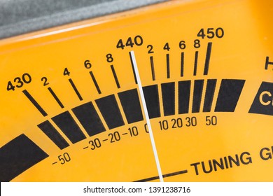 Macro close up detail of calibration meter on old guitar tuner. - Shutterstock ID 1391238716