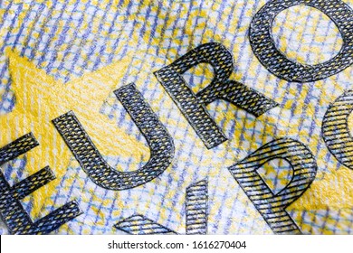 Macro close up of the intaglio print on a five euro banknote, high resolution capture. Sharp detailed shot of the euro character on the ecb 5 euro note. the embossing of the print nicely to see.