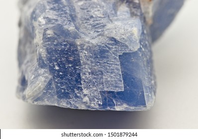 Macro Close Up On Details Of A Light Blue Calcite Mineral Stone, On A White Limbo Background