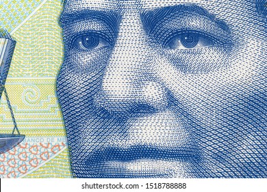 Macro close up photograph of Benito Juarez on the Mexican 20 Peso currency note.  