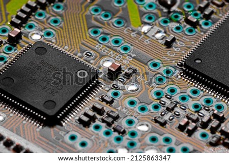 Macro Close up of printed wiring and components on PC circuit board	