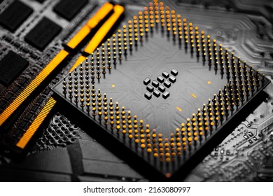 Macro Close up of RAM Memory and pins on Main CPU PC processor circuit board.	