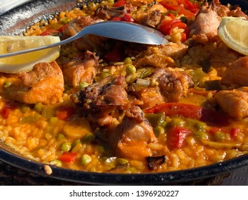 Macro Close Up Shot Of Traditional Chicken Paella Served In A Restaurant In Marbella, Spain. Real Spanish Food