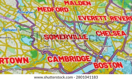 Macro close up of a Somerville Massachusetts map showcasing detailed streets, roads, neighborhoods, and modern cartography with sharp geographic details, suitable for travel, navigation, geography, and location themes.