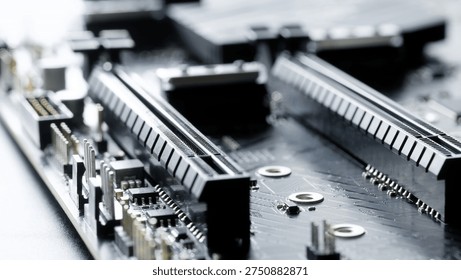 Macro close up of two PCI Express x16 slots on a modern computer motherboard. Expansion connectors for graphics cards, workstation upgrades, and high performance PC builds. Photo