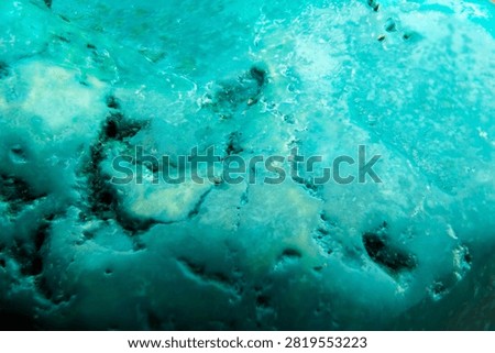 Macro Close Up View of Raw Turquoise Rock Texture Surface