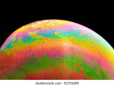 Macro closeup of a colorful soap bubble