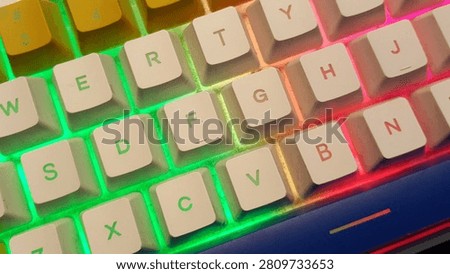 A macro close-up of a custom mechanical keyboard focusing on the prominent orange Enter key and white Shift key. Illuminated by a vibrant neon purple and pink RGB LED backlight, this colorful peripheral layout represents digital execution, computer programming, cybersecurity, and modern gaming setups.