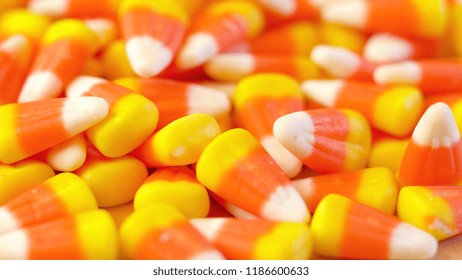 Macro Closeup Of Halloween Traditional Candy Corn Treats Background.