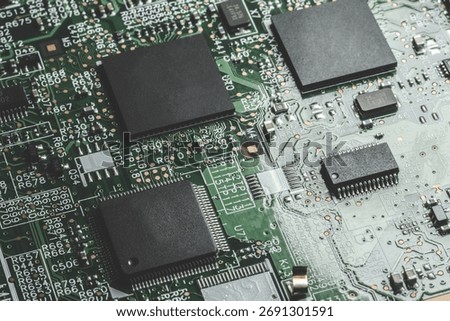 Macro Close-up Shot of Microchip, CPU Processor on Printed Circuit Board, Computer Motherboard with Components Inside of Electronic Device, Part of Supercomputer.