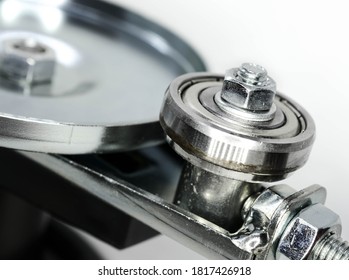 Macro Closeup Of Silver Metal Canning Machine. Nut, Bolt And Thread. Metal Disc