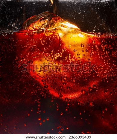 macro cola drink texture,macro cola background,Background of cola with ice and bubbles. Side view background of refreshing cola flavored soda with carbonated with vintage tone,