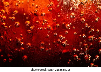 Macro Cola Drink Texture,macro Soft Drink Texture,Close Up View Of Ice Cubes In Dark Cola Background. Textures Of Sweet Summer Cold Drinks With Foam And Macro Bubbles On Fizzing Glass Wall.