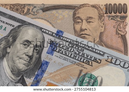 Macro Comparison of US Hundred Dollar Bill and Japanese 10000 Yen Banknote