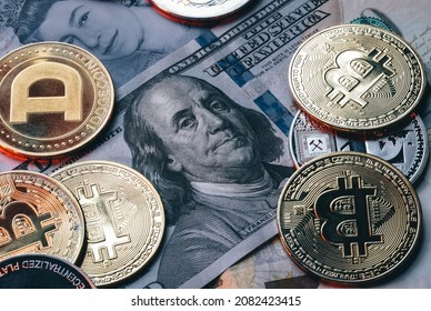 Macro concept of portraits of Benjamin Franklin from one hundred dollar bill, and Queen Elizabeth II from twenty pounds bill. Dollars surrounded by Bitcoin, and Dodge. Not an original bills