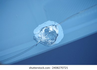 Macro of a damaged car windshield