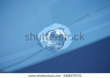 Macro of a damaged car windshield
