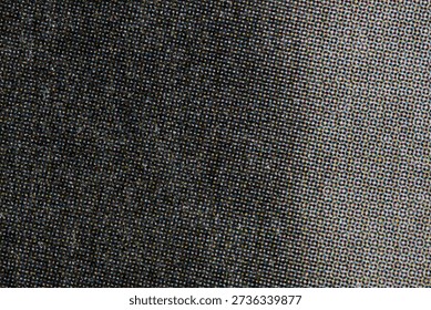 Macro of dense black halftone dots transitioning into a lighter CMYK-style raster field. Textured print grain and subtle scratches create a vintage, gritty background for design use.