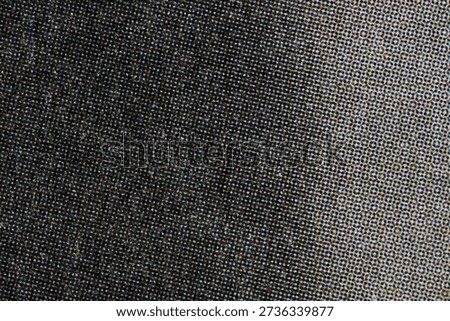 Macro of dense black halftone dots transitioning into a lighter CMYK-style raster field. Textured print grain and subtle scratches create a vintage, gritty background for design use.
